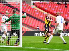 Hebburn Town's Thomas Potter (centre) shoots towards goal during the Buildbase FA Vase 2019/20 Final at Wembley Stadium, London. PA picture.