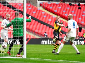 Hebburn Town's Thomas Potter (centre) shoots towards goal during the Buildbase FA Vase 2019/20 Final at Wembley Stadium, London. PA picture.