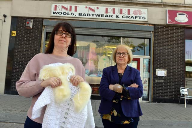 Susan Harris and daughter Jacqueline Brown from Knit 'N' Purl are angry over thieves stealing hand knitted baby clothes and blankets.