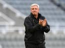 Steve Bruce applauds fans at St James's Park last season.