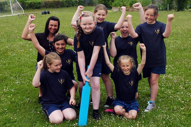 Owton Manor Primary School kwik cricket team Kaitlan Hogbin plays a stroke as fellow members Gerogia Ainsley, Bethany Stanley, Caitlyn Wilson, Brooke Butcher, Rhiannon Tingle and Mia Buck look on. Here they are with teacher Tracey Ward in 2013.