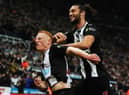 Matty Longstaff of Newcastle United celebrates with team mate Andy Carroll after he scores the only goal of the game during the Premier League match between Newcastle United and Manchester United at St. James Park on October 06, 2019 in Newcastle upon Tyne, United Kingdom.