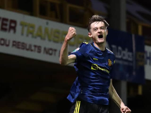 Joe Hugill celebrates scoring for Manchester United Under-21s in the Papa John's Trophy against Bradford.