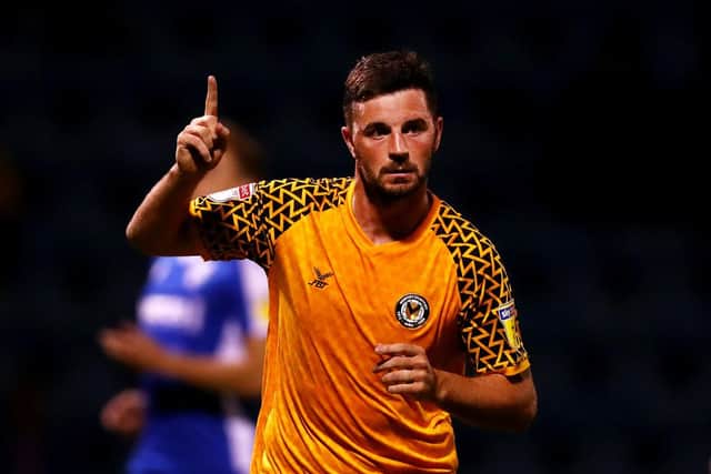 GILLINGHAM, ENGLAND - AUGUST 13: Padraig Amond of Newport County celebrates after scoring his team's second goal from the penalty spot during the Carabao Cup First Round match between Gillingham and Newport County at MEMS Priestfield Stadium on August 13, 2019 in Gillingham, England. (Photo by Jack Thomas/Getty Images)