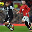 Newcastle United's English defender Danny Simpson (L) vies with Manchester United's English striker Wayne Rooney (R) during the English Premier League football match between Manchester United and Newcastle United at Old Trafford in Manchester, north-west England on November 26, 2011. AFP PHOTO/PAUL ELLIS