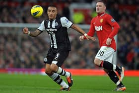 Newcastle United's English defender Danny Simpson (L) vies with Manchester United's English striker Wayne Rooney (R) during the English Premier League football match between Manchester United and Newcastle United at Old Trafford in Manchester, north-west England on November 26, 2011. AFP PHOTO/PAUL ELLIS