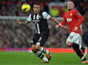Newcastle United's English defender Danny Simpson (L) vies with Manchester United's English striker Wayne Rooney (R) during the English Premier League football match between Manchester United and Newcastle United at Old Trafford in Manchester, north-west England on November 26, 2011. AFP PHOTO/PAUL ELLIS