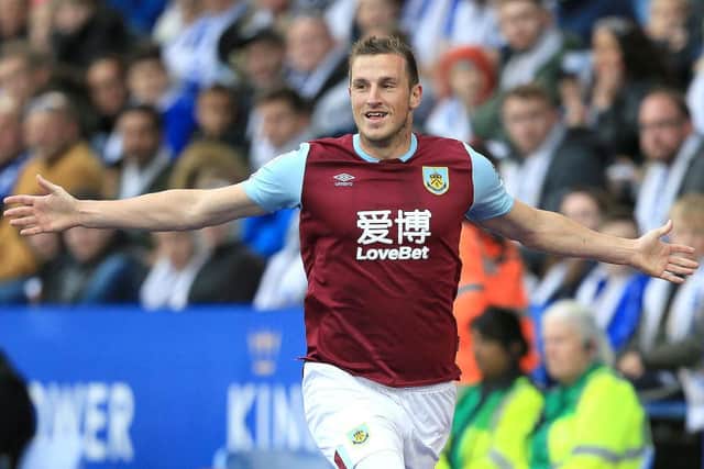 Chris Wood of Burnley celebrates after scoring his team's first goal during the Premier League match between Leicester City and Burnley FC at The King Power Stadium on October 19, 2019 in Leicester, United Kingdom. (Photo by Stephen Pond/Getty Images)