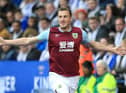 Chris Wood of Burnley celebrates after scoring his team's first goal during the Premier League match between Leicester City and Burnley FC at The King Power Stadium on October 19, 2019 in Leicester, United Kingdom. (Photo by Stephen Pond/Getty Images)