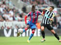Wilfried Zaha of Crystal Palace controls the ball under pressure from Fabian Schar of Newcastle United during the Premier League match between Newcastle United and Crystal Palace at St. James Park on September 03, 2022 in Newcastle upon Tyne, England. (Photo by Jan Kruger/Getty Images)