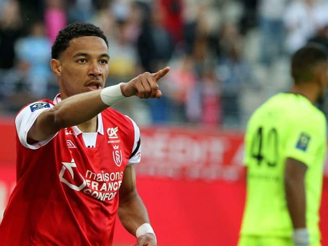 Hugo Ekitike celebrates after scoring a goal for Stade de Reims against Nice last season.