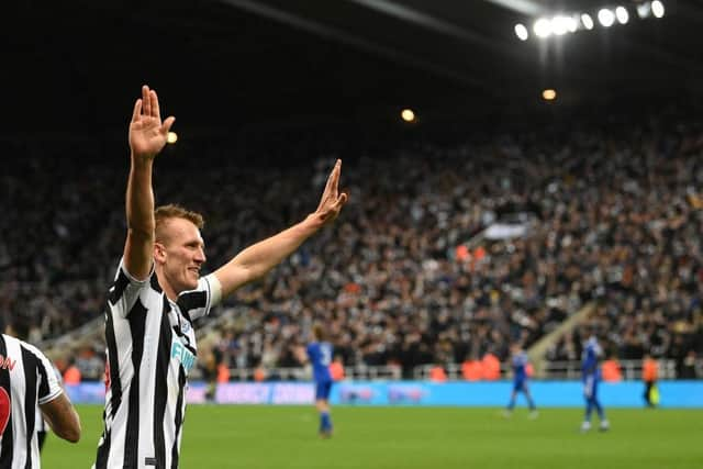 Newcastle player Dan Burn celebrates after scoring the opening goal during the Carabao Cup Quarter Final match between Newcastle United and Leicester City at St James' Park on January 10, 2023 in Newcastle upon Tyne, England. (Photo by Stu Forster/Getty Images)