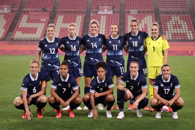 Players of Team Great Britain pose for a team photograph prior to the Women's Group E match between Canada and Great Britain on day four of the Tokyo 2020 Olympic Games at Kashima Stadium on July 27, 2021 in Kashima, Ibaraki, Japan. (Photo by Atsushi Tomura/Getty Images)