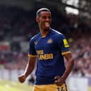 Alexander Isak of Newcastle United celebrates after scoring the team's second goal during the Premier League match between Brentford FC and Newcastle United at Brentford Community Stadium on April 08, 2023 in Brentford, England. (Photo by Alex Pantling/Getty Images)