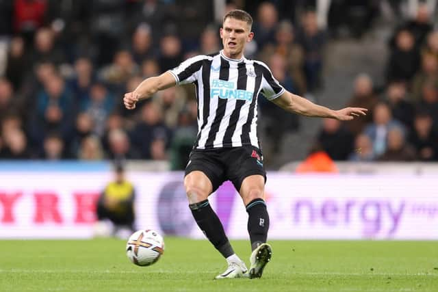 Sven Botman of Newcastle United passes the ball during the Premier League match between Newcastle United and Everton FC at St. James Park on October 19, 2022 in Newcastle upon Tyne, England. (Photo by George Wood/Getty Images)