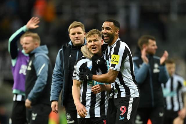 Matt Ritchie and Callum Wilson of Newcastle United celebrate following the Premier League match between Newcastle United and Wolverhampton Wanderers at St. James Park on March 12, 2023 in Newcastle upon Tyne, England. (Photo by Michael Regan/Getty Images)