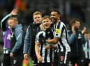 Matt Ritchie and Callum Wilson of Newcastle United celebrate following the Premier League match between Newcastle United and Wolverhampton Wanderers at St. James Park on March 12, 2023 in Newcastle upon Tyne, England. (Photo by Michael Regan/Getty Images)