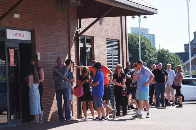 Fans queuing outside the ticket office on Friday