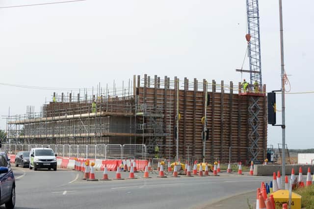 Walls have been built ready to take the new bridge.