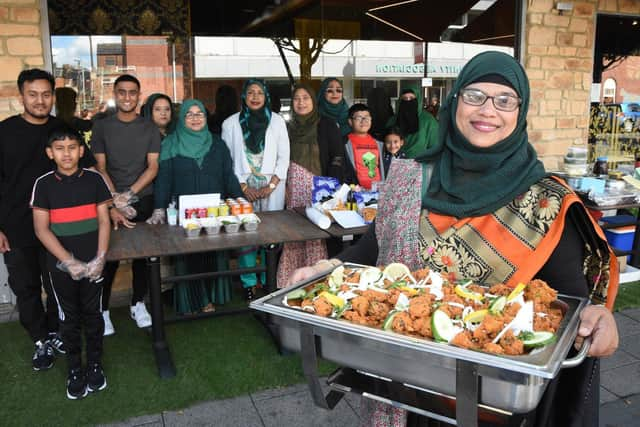 Asma Bejum and her family hoped for a busy trading day in the fine weather.