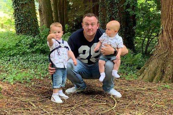 Mark Beadle with sons Ethan and Harrison.