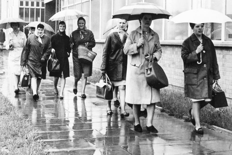 Plessey workers arriving for a day's work in May 1967.