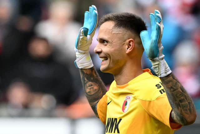 Augsburg goalkeeper Rafal Gikiewicz has revealed he had interest from Newcastle United in the summer (Photo by CHRISTOF STACHE/AFP via Getty Images)