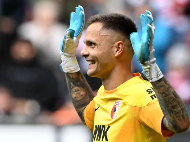 Augsburg goalkeeper Rafal Gikiewicz has revealed he had interest from Newcastle United in the summer (Photo by CHRISTOF STACHE/AFP via Getty Images)