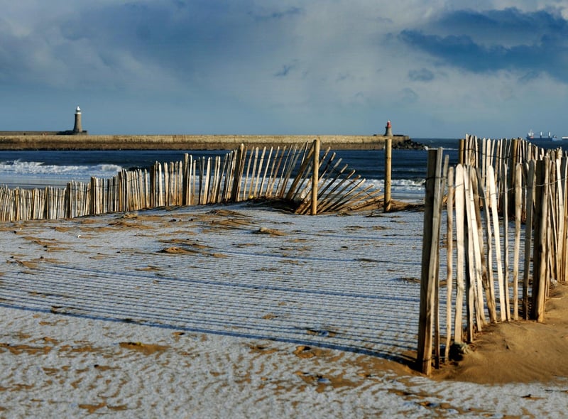 Snow covers the dunes at Sandhaven Beach in 2015.