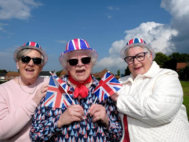 People out celebrating the coronation