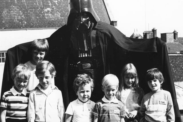 Darth Vader popped into T and G Allan's shop in King Street 39 years ago and met, from left:  David Wardle, Lee Foster, Graham Hunter, Ben Alexander, Stewart Cross, Victoria Watson and Paul Kolster.