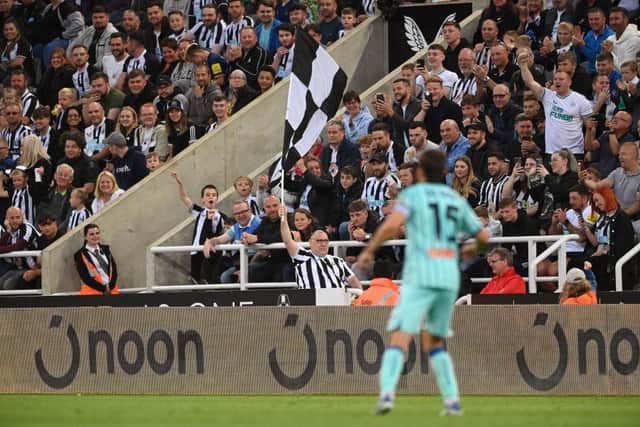 A Newcastle fan in a wheelchair waves a flag during the Pre Season friendly match between Newcastle United and Atalanta (Photo by Stu Forster/Getty Images)