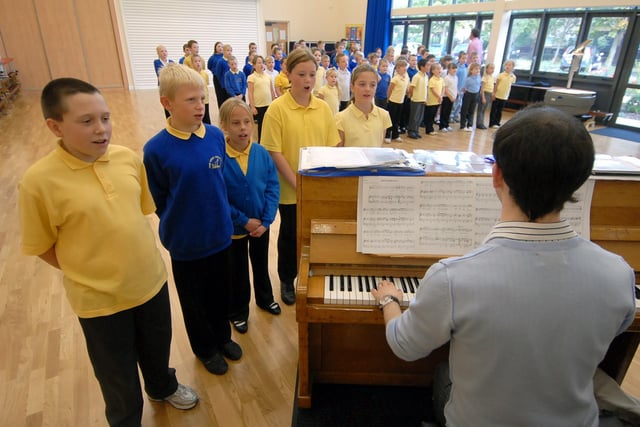 A singing session at the school in 2007. Who do you recognise?