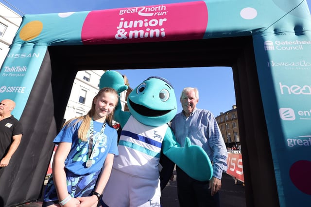 Great North Run founder Brendan Foster and Elizabeth Schulz, 11, who designed mascot Tyney.
