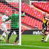 Hebburn Town's Thomas Potter (centre) shoots towards goal during the Buildbase FA Vase 2019/20 Final at Wembley Stadium, London. PA.