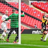 Hebburn Town's Thomas Potter (centre) shoots towards goal during the Buildbase FA Vase 2019/20 Final at Wembley Stadium, London. PA.