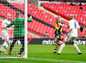 Hebburn Town's Thomas Potter (centre) shoots towards goal during the Buildbase FA Vase 2019/20 Final at Wembley Stadium, London. PA.