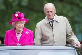 Queen Elizabeth II and Prince Philip, Duke of Edinburgh pictured during The Patron's Lunch celebrations for The Queen's 90th birthday at The Mall on June 12, 2016 in London.