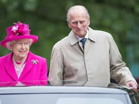 Queen Elizabeth II and Prince Philip, Duke of Edinburgh pictured during The Patron's Lunch celebrations for The Queen's 90th birthday at The Mall on June 12, 2016 in London.