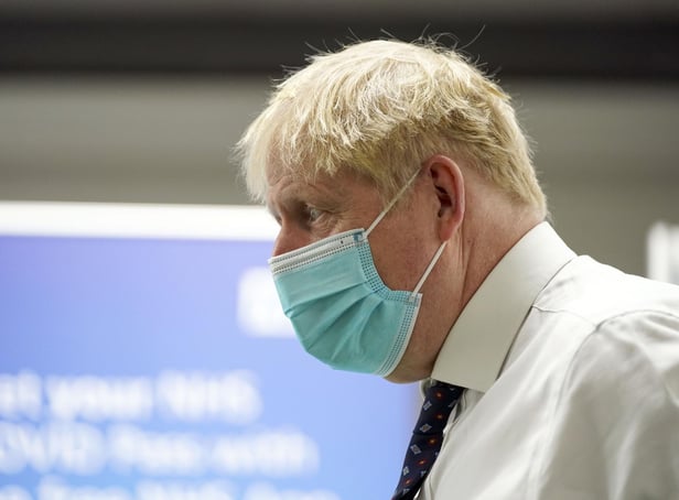 Prime Minister Boris Johnson during a visit to a vaccination hub in the Guttman Centre at Stoke Mandeville Stadium in Aylesbury, Buckinghamshire, as the booster vaccination programme continues. Picture date: Monday January 3, 2022.