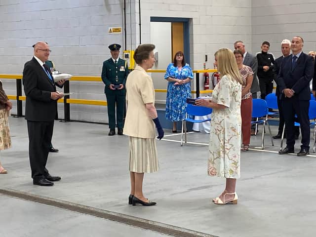 Clare Graham, from Sunderland, receiving her award from Princess Anne