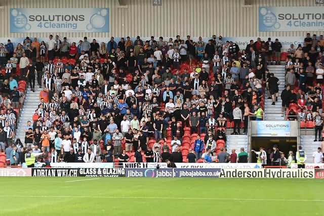 Newcastle United fans at the Keepmoat Stadium.