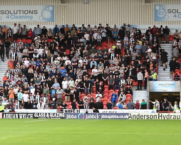 Newcastle United fans at the Keepmoat Stadium.