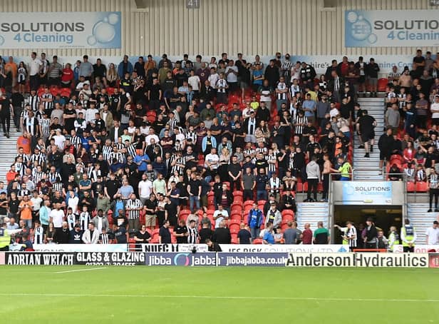 Newcastle United fans at the Keepmoat Stadium.