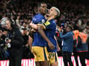 Newcastle United striker Alexander Isak celebrates his winner with Bruno Guimaraes.
