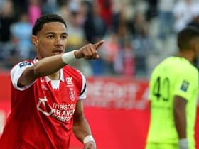 Reims' French forward Hugo Ekitike celebrates after scoring a goal during the French L1 football match between Stade de Reims and OGC Nice at Stade Auguste-Delaune in Reims, northern France on May 21, 2022. (Photo by FRANCOIS NASCIMBENI/AFP via Getty Images)