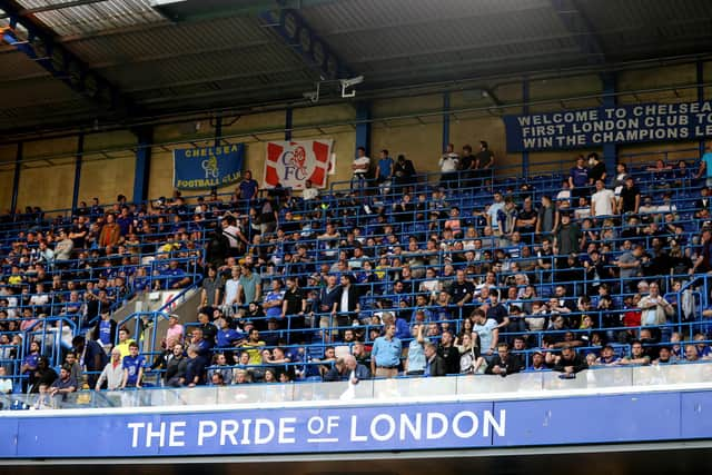 LONDON, ENGLAND - AUGUST 04: Fans of Chelsea in a new safe standing area during the Pre Season Friendly match between Chelsea and Tottenham Hotspur at Stamford Bridge on August 04, 2021 in London, England. (Photo by Catherine Ivill/Getty Images)