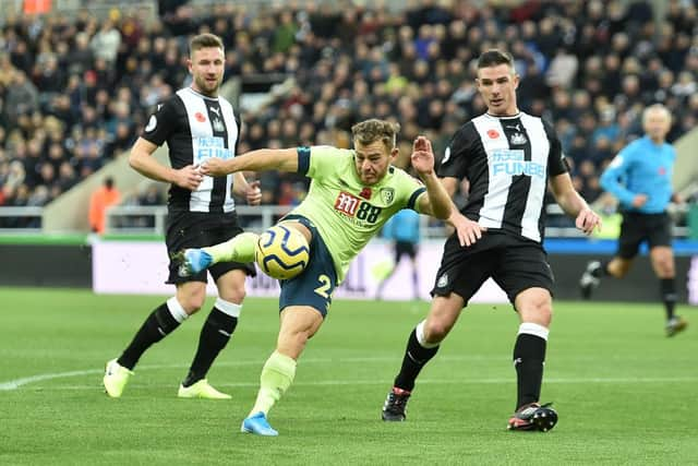 Ryan Fraser of AFC Bournemouth shoots during the Premier League match between Newcastle United and AFC Bournemouth  at St. James Park on November 09, 2019 in Newcastle upon Tyne, United Kingdom.