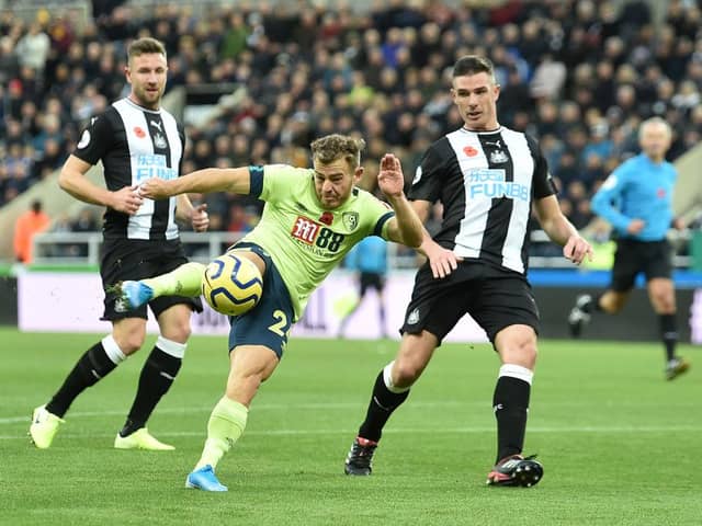 Ryan Fraser of AFC Bournemouth shoots during the Premier League match between Newcastle United and AFC Bournemouth  at St. James Park on November 09, 2019 in Newcastle upon Tyne, United Kingdom.
