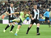 Ryan Fraser of AFC Bournemouth shoots during the Premier League match between Newcastle United and AFC Bournemouth  at St. James Park on November 09, 2019 in Newcastle upon Tyne, United Kingdom.